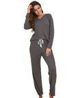 Women wearing gray waffle long sleeve pajama suit, perfect for home and outdoor casual comfort.