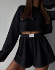 Hollow Long-sleeved Suit With Loose Round-neck Tops And Elastic Split Shorts Fashion Women's Clothing