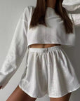 Hollow Long-sleeved Suit With Loose Round-neck Tops And Elastic Split Shorts Fashion Women's Clothing