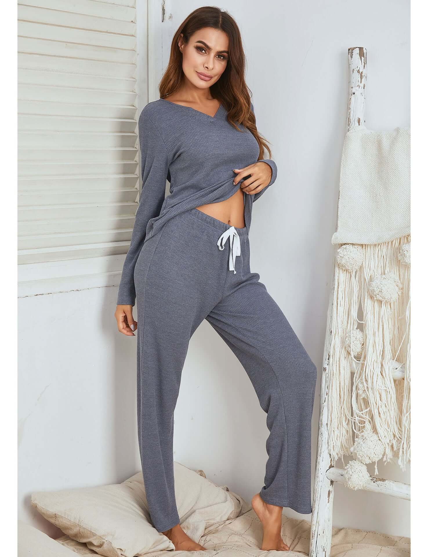 Women in gray waffle long sleeve pajamas, showcasing casual and comfortable homewear style.